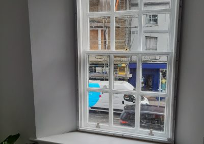 Hand built triple glazing panel for a noisy street